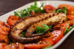 buonissimo polpo grigliato con rucola sanmarzano e crema di aceto balsamico dellacetaia giuseppe giusti - a Trastevere da buonissimo polpo grigliato con rucola, sanmarzano e crema di aceto balsamico dell’acetaia giuseppe giusti