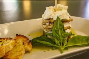 millefoglie di melanzane con mozzarella di bufala e stracciatella a trastevere da bruno alla lungaretta - a Trastevere da antipasto di millefoglie di melanzane con mozzarella di bufala e stracciatella a trastevere da bruno alla lungaretta